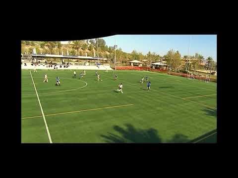 Video of Ava playing holding mid #7 taking a shot with left foot 