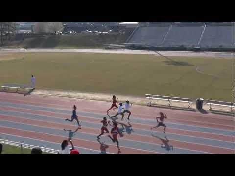 Video of First place runner with red and white jersey and short black tights