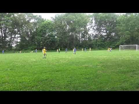 Video of Belle use chest to feet after goalie fumble and kicked ball between two defenders for goal