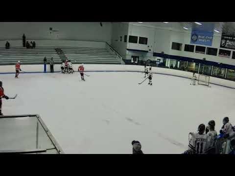 Video of # 91 Orange wins D zone face off/change of direction along boards/pass/drop pass to trailer (U14 2018-19)