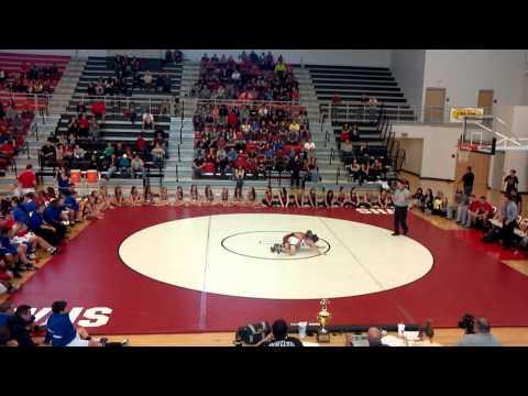 Video of Justin in white Moore singlet wrestling Westmoore wrestler in Moore Festival for City Championship freshman year!
