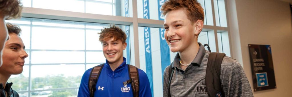 Two IMG student-athletes smiling